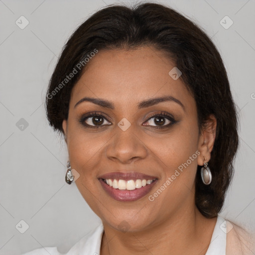 Joyful black young-adult female with medium  brown hair and brown eyes