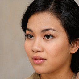 Neutral asian young-adult female with medium  brown hair and brown eyes