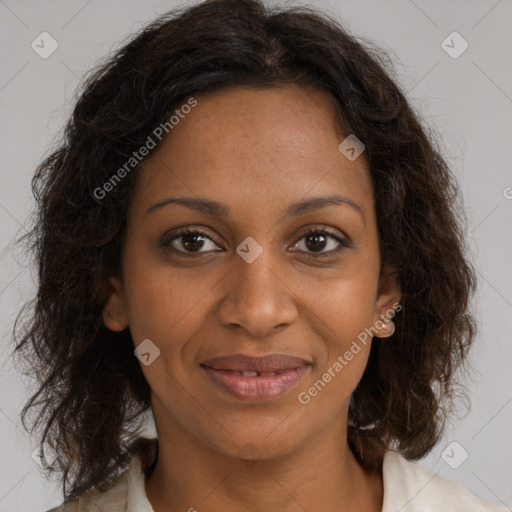 Joyful black young-adult female with medium  brown hair and brown eyes