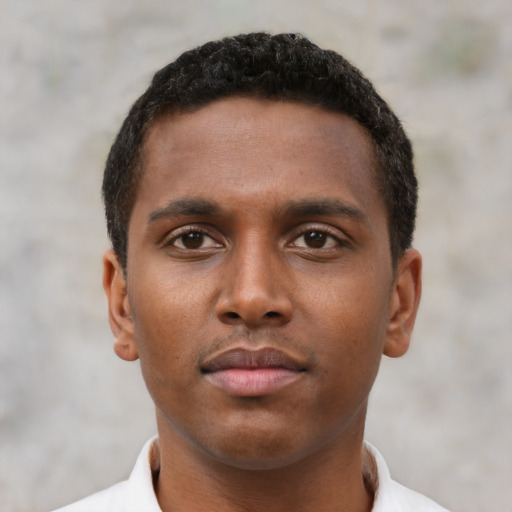 Neutral black young-adult male with short  brown hair and brown eyes