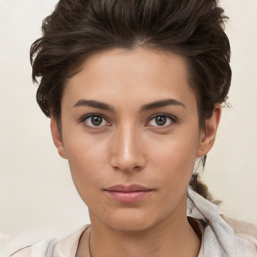 Neutral white young-adult female with short  brown hair and brown eyes