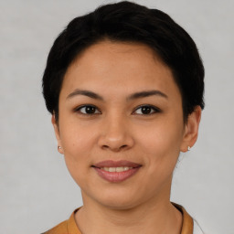 Joyful asian young-adult female with short  black hair and brown eyes