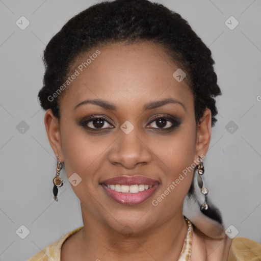 Joyful black young-adult female with long  brown hair and brown eyes