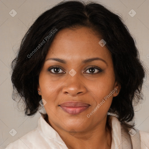 Joyful black adult female with medium  brown hair and brown eyes