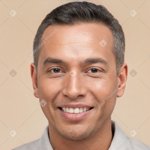 Joyful white adult male with short  brown hair and brown eyes