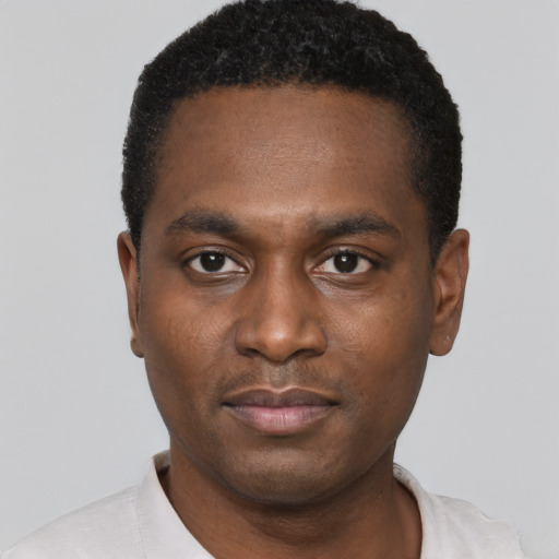 Neutral black young-adult male with short  black hair and brown eyes