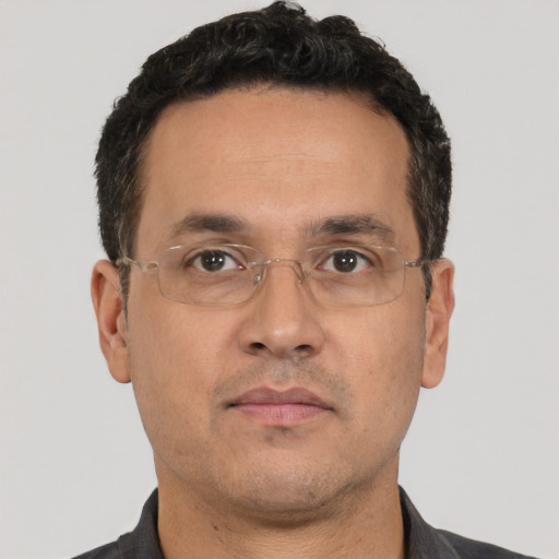 Neutral white adult male with short  black hair and brown eyes