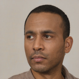 Neutral black young-adult male with short  black hair and brown eyes