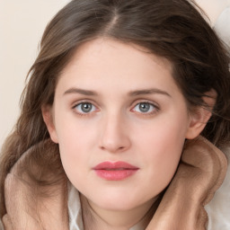 Neutral white young-adult female with long  brown hair and blue eyes