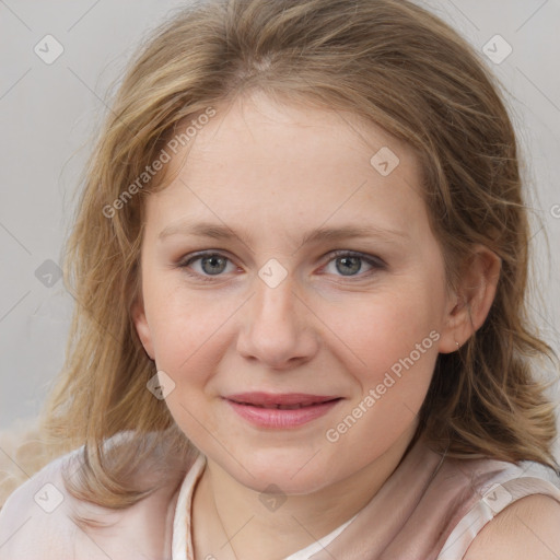 Joyful white young-adult female with medium  brown hair and blue eyes