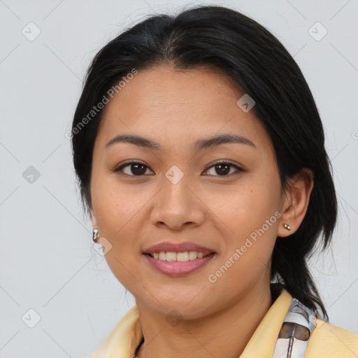 Joyful asian young-adult female with medium  brown hair and brown eyes