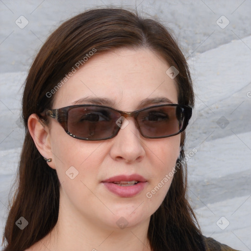 Joyful white young-adult female with medium  brown hair and blue eyes