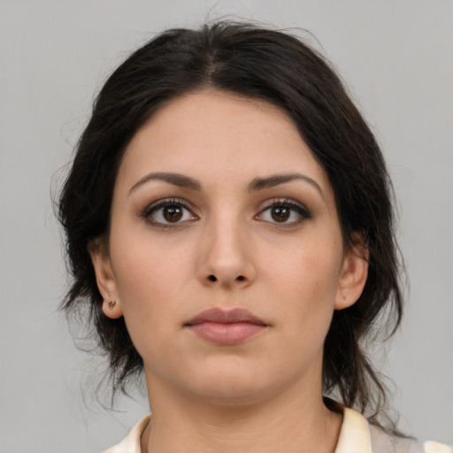 Neutral latino young-adult female with medium  brown hair and brown eyes