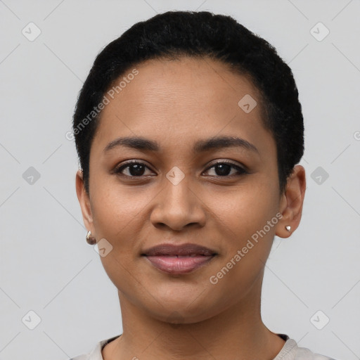 Joyful latino young-adult female with short  black hair and brown eyes