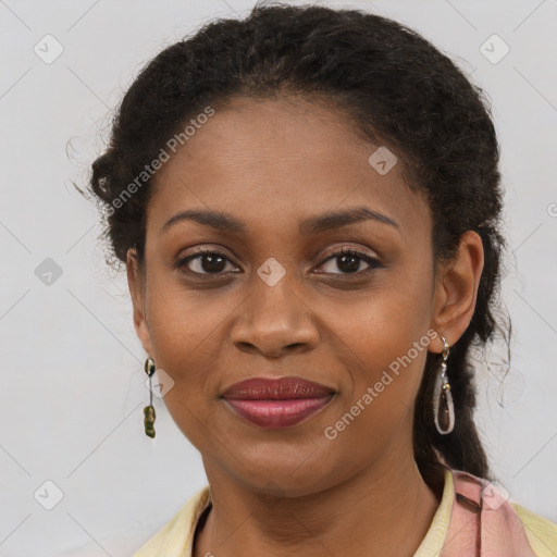 Joyful black young-adult female with long  brown hair and brown eyes