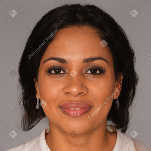 Joyful black young-adult female with medium  brown hair and brown eyes