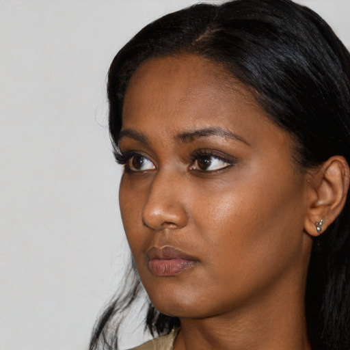 Neutral asian young-adult female with long  black hair and brown eyes