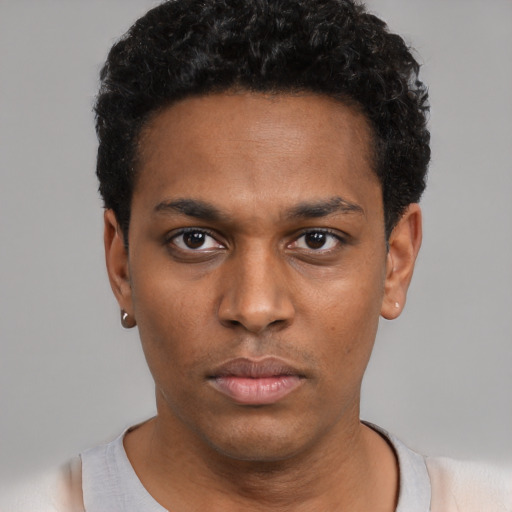 Neutral black young-adult male with short  black hair and brown eyes