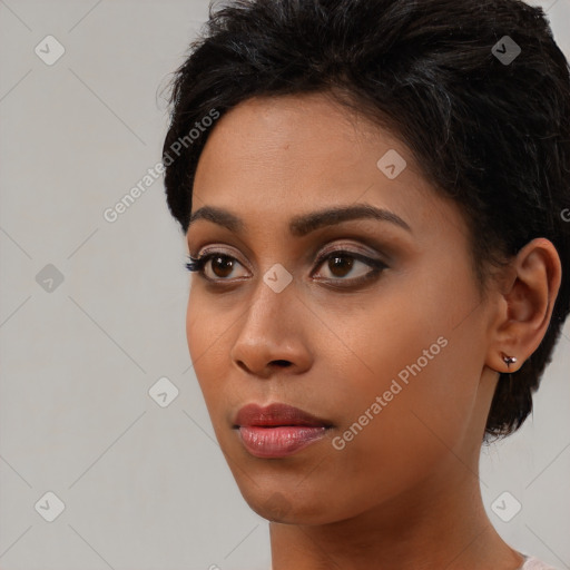 Neutral black young-adult female with short  black hair and brown eyes