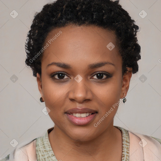 Joyful black young-adult female with short  black hair and brown eyes