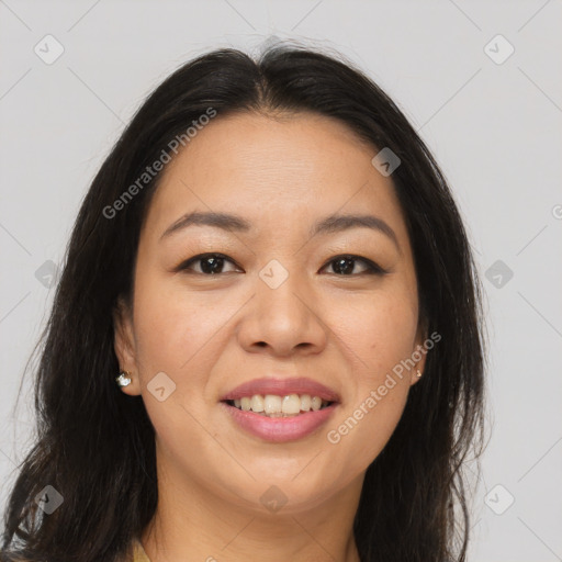 Joyful asian young-adult female with long  brown hair and brown eyes