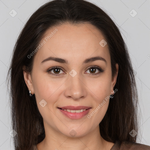 Joyful white young-adult female with long  brown hair and brown eyes