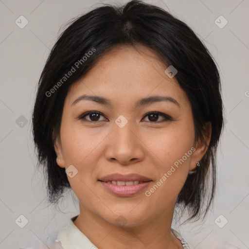 Joyful asian young-adult female with medium  brown hair and brown eyes