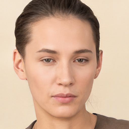 Neutral white young-adult female with short  brown hair and brown eyes