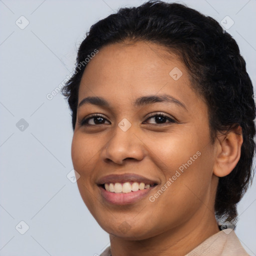 Joyful latino young-adult female with medium  black hair and brown eyes