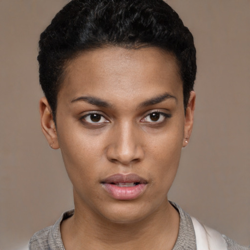 Neutral latino young-adult female with short  black hair and brown eyes