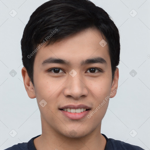 Joyful white young-adult male with short  black hair and brown eyes