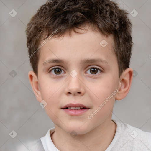 Joyful white child male with short  brown hair and brown eyes