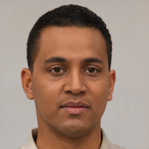 Neutral latino young-adult male with short  black hair and brown eyes