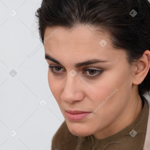 Neutral white young-adult female with medium  brown hair and brown eyes