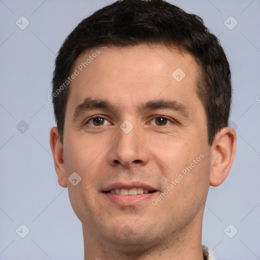 Joyful white young-adult male with short  brown hair and brown eyes