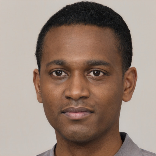 Neutral black young-adult male with short  black hair and brown eyes