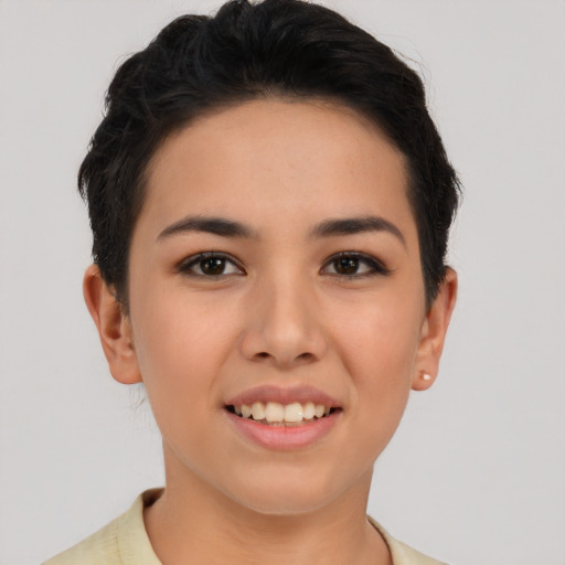 Joyful asian young-adult female with short  brown hair and brown eyes