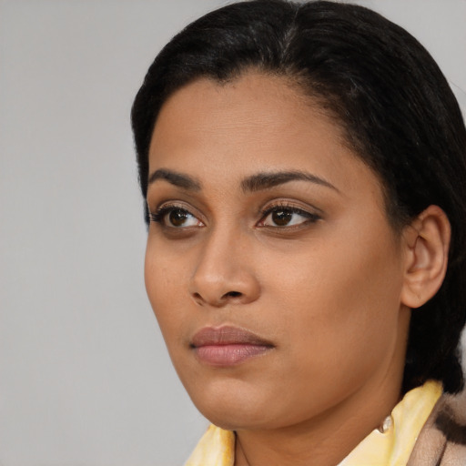 Neutral latino young-adult female with medium  black hair and brown eyes
