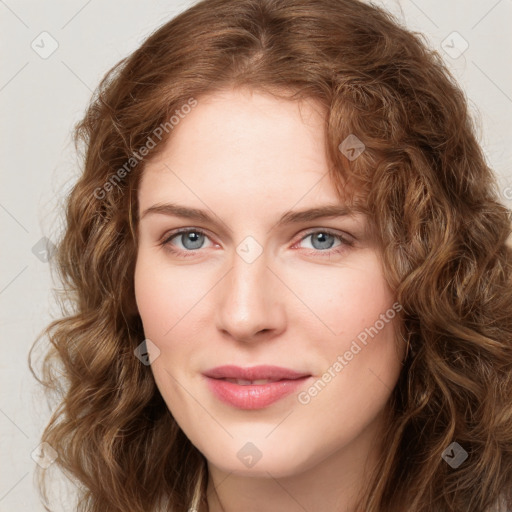 Joyful white young-adult female with long  brown hair and green eyes