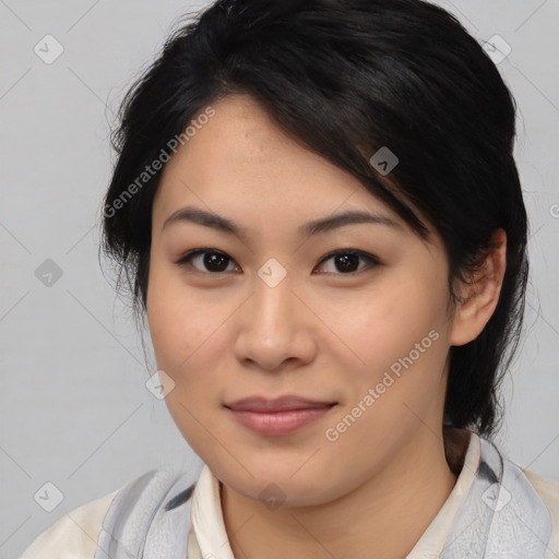 Joyful asian young-adult female with medium  black hair and brown eyes