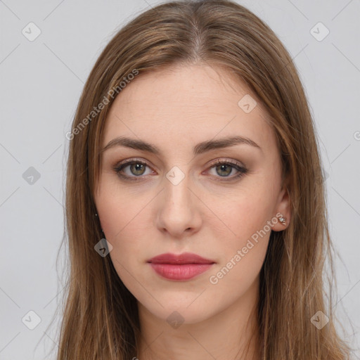 Neutral white young-adult female with long  brown hair and brown eyes