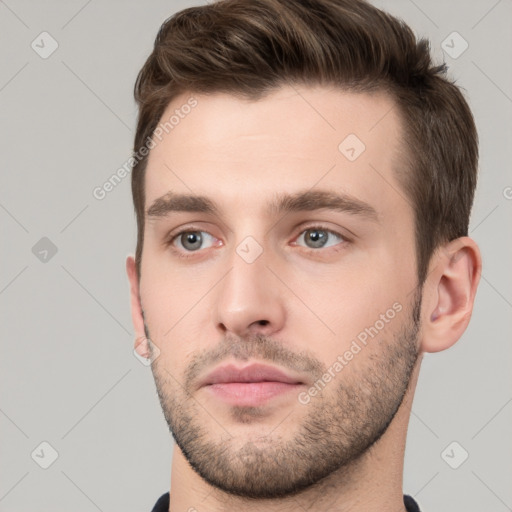 Neutral white young-adult male with short  brown hair and brown eyes