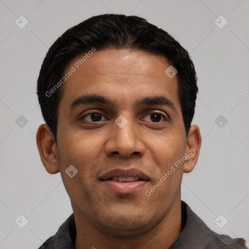 Joyful latino young-adult male with short  black hair and brown eyes