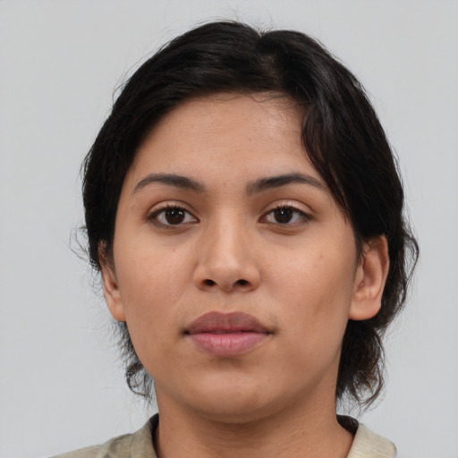 Neutral latino young-adult female with medium  black hair and brown eyes