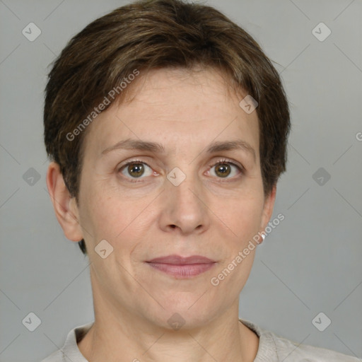 Joyful white adult female with short  brown hair and grey eyes