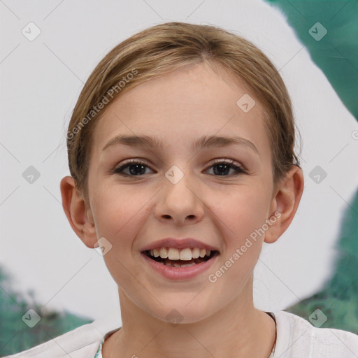 Joyful white child female with short  brown hair and brown eyes