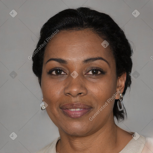 Joyful black adult female with medium  black hair and brown eyes