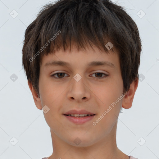 Joyful white child male with short  brown hair and brown eyes