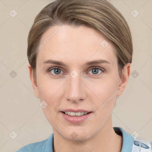 Joyful white young-adult female with short  brown hair and grey eyes