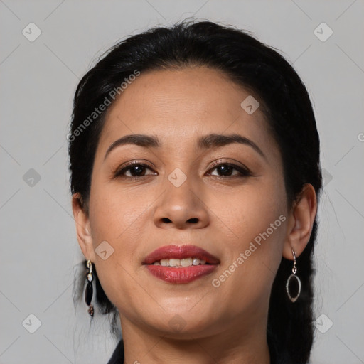 Joyful latino young-adult female with medium  black hair and brown eyes